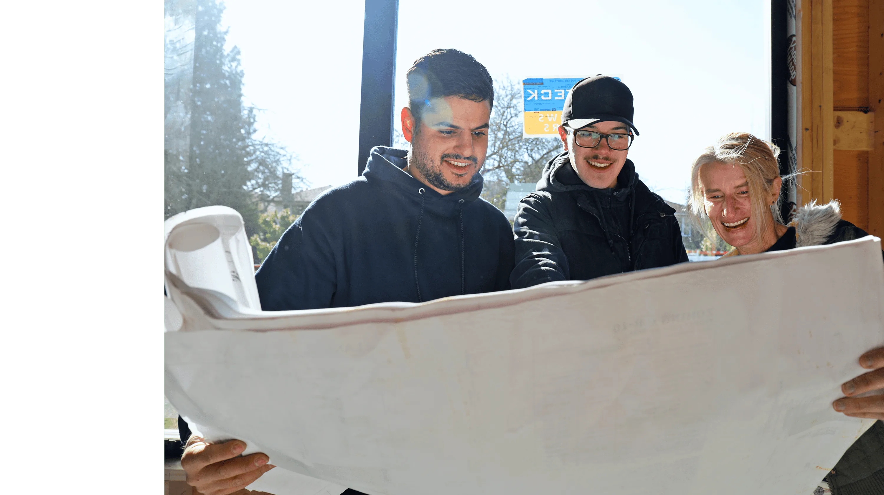Bruno and apprentice reviewing project drawings