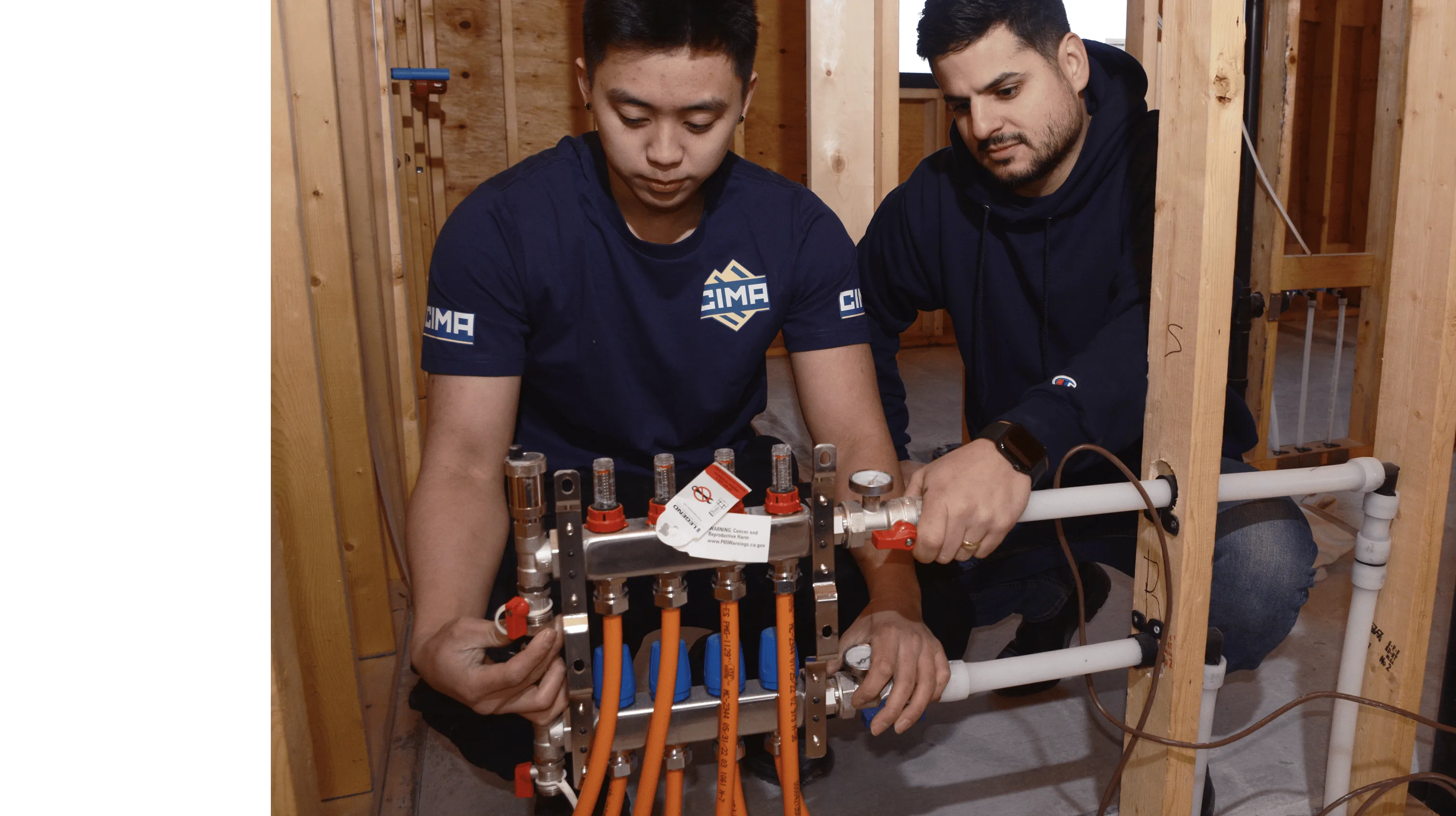 Bruno mentoring an apprentice on the job
