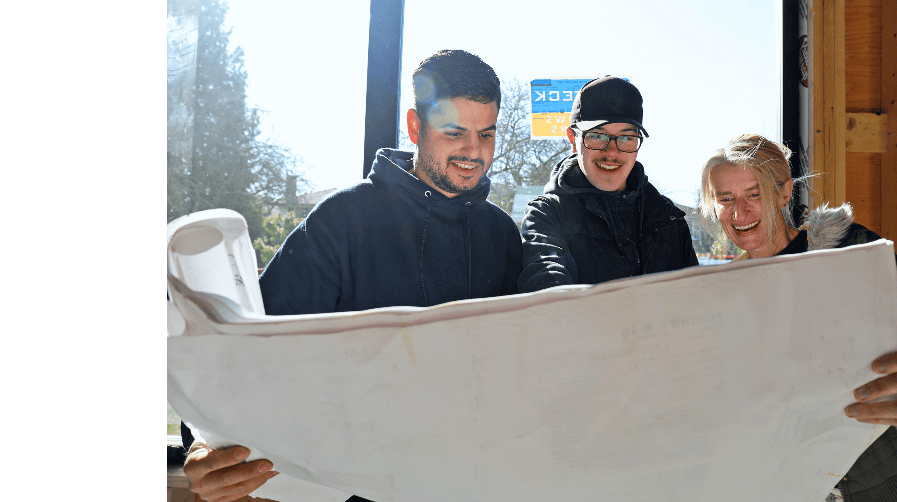 Bruno with apprentice looking at drawings